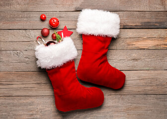 Obraz na płótnie Canvas Composition with Christmas socks on wooden background