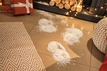 Footprints of Santa on floor in room