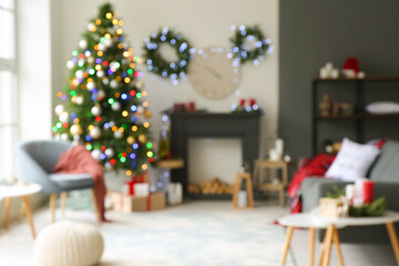 Interior of living room decorated for Christmas, blurred view