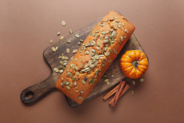 Tasty pumpkin pie on color background