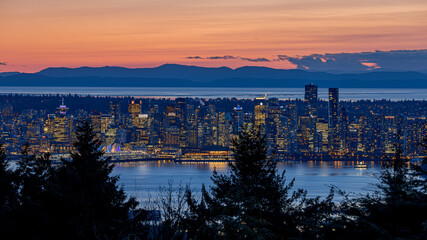 Downtown Vancouver, Canada at Sunset or dusk with Vancouver Island in the background