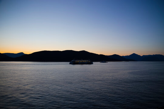 two ferries passing on Howe Sound with Bowen Island in the distance