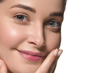 Beautiful happy woman face grey eyes close up with healthy clean skin beauty