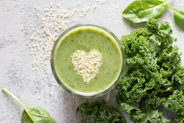 Healthy green smoothie with heart of seeds linseed