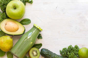 Glass of fresh juice from green fruits and vegetables
