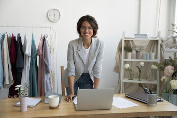 When hobby becomes business. Portrait of successful young woman designer dressmaker florist looking...