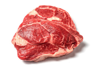 Fresh raw rib eye steak on white isolated surface. Meat industry product. Premium tender meat cut.