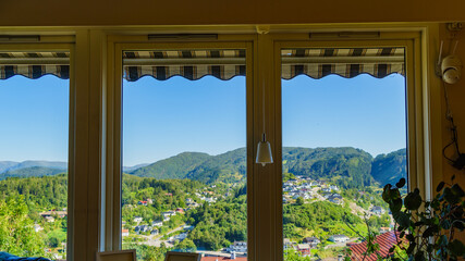 House window with norwegian landscape