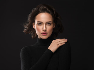 Beautiful woman portrait face over black background