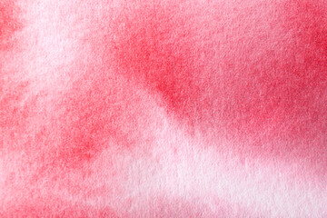 Red or pink watercolor background. Aquarelle hand painted texture paper. Drawing concept
