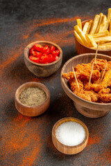 Vertical view of french fried menu on mixed color background