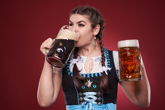 Woman with brown and pale beer