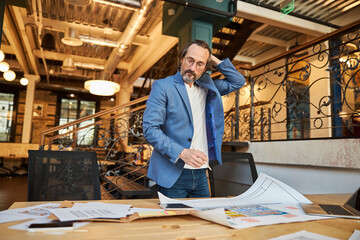 Confused office worker thinking of ways to resolve a task