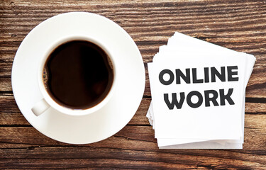 Word writing text ONLINE WORK . Business concept for Urgent Move.Text in stickers with a cap of coffee