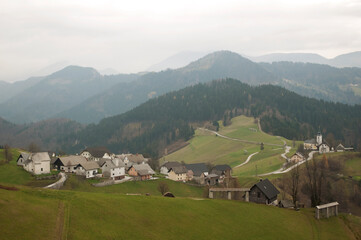 Fototapeta na wymiar Small Mountain Village in Slovenia