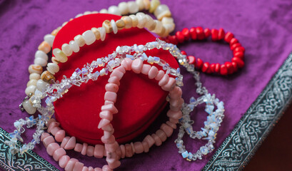 Set of mineral stones as amethyst, rhinestone, coral, lapis lazuli , woman accessorize