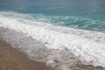 waves on the beach after rain