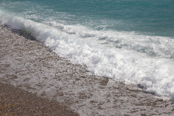 waves on the beach after rain