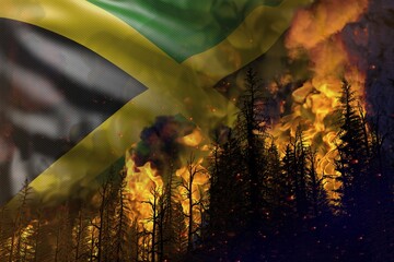 Forest fire fight concept, natural disaster - infernal fire in the woods on Jamaica flag background - 3D illustration of nature