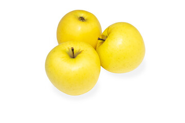 Three sweet and juicy yellow golden apples isolated on white background.