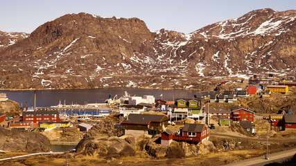 Sisimiut village Impressions with colorful painted houses at the start of the Arctic Circle Trail on the East coast of Greenland. © Christopher