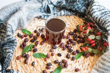 Rosehip tea. Poured organic bunch of rosehips.