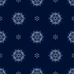 Fototapeta na wymiar Snowflake seamless vector pattern on a blue background.