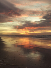 Fototapeta na wymiar Golden hour sunset on the beach