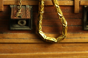 Gold necklace scene represent treasure and transportation business concept related idea.