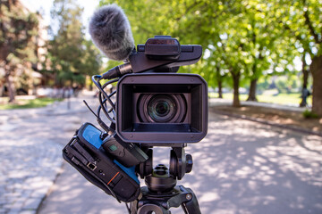 TV camera on the street. Shooting plots. Television.