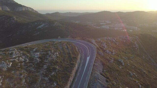 Mountain Road shot by Drone - Sunset 4k Panoramic View - La Gineste, Luminy, Marseille, Mediterranean Coast, France, South Europe