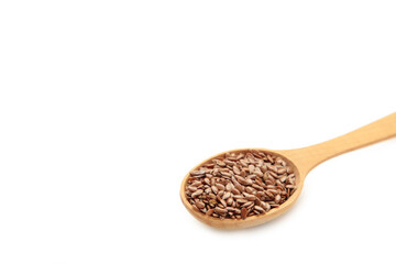 Close up of flax seeds in a wooden spoon on white background with clipping path