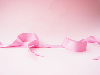 banner Curled Pink Ribbon On pink.