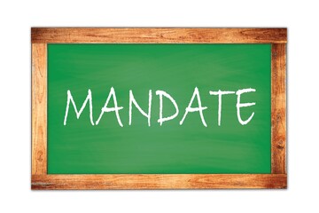 Obraz premium MANDATE text written on green school board.