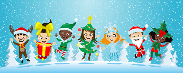 Fototapeta premium Happy children in Christmas costumes on the background of winter nature.