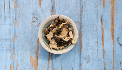 Vegetarian dish with sesame and Portobello mushrooms