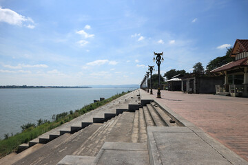 Concrete walkway and way down to the Mekong River Between Thailand and Laos