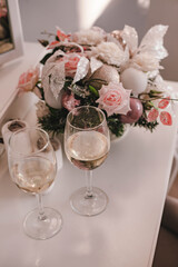 champagne glasses and flowers