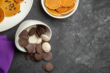 top view yummy little pancakes with cookies on dark background dessert sweet cake