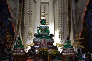 Fototapeta premium Seated Green Buddhas in Dhyana Mudra, Linh Phuoc Pagoda, Da Lat, Vietnam