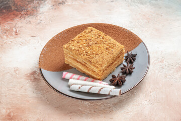 front view delicious cake slice inside plate on light background sweet cake biscuit pie
