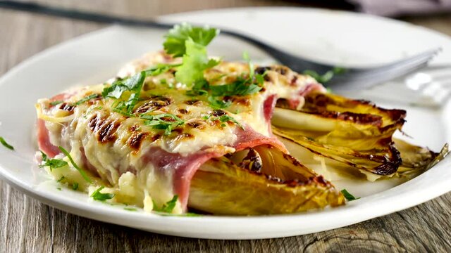 baked chicory with ham and cheese