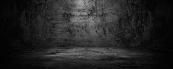 Dark concrete room with light background.