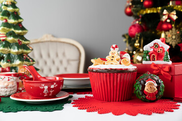 Christmas Eve. Christmas tableware and decorations on rustic wooden table.