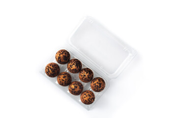 Just baked chocolate muffins packaged isolated on white background