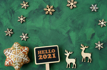 Fototapeta na wymiar Hello 2021. Christmas background with reindeer and snowflakes