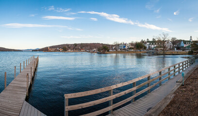 Late afternoon view of Lake Winnipesaukee and Meredith, New Hampshire, on a clear, crisp blue sky day.