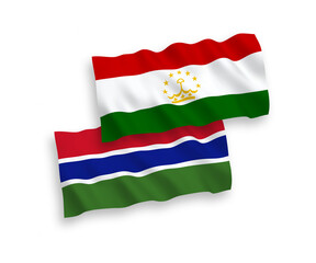 Flags of Tajikistan and Republic of Gambia on a white background