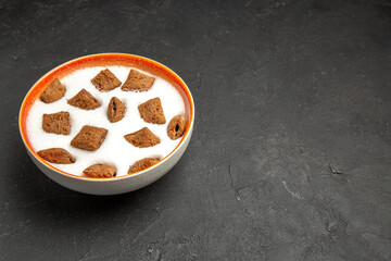 front view pillow cookies with milk for breakfast on dark desk sweet biscuit milk kid