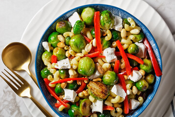 macaroni salad with broccoli sprouts, top view